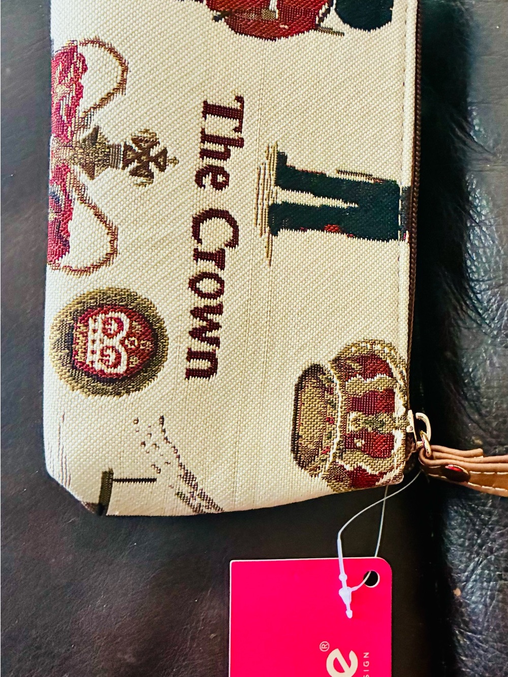 The Crown Beige Canvas Wristlet Clutch with Crest Motifs